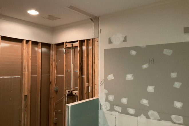 A bathroom remodeling project in process--the framing is visible after demolition