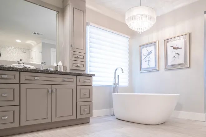 A freestanding tub in a bathroom designed and built by Ranney Blair