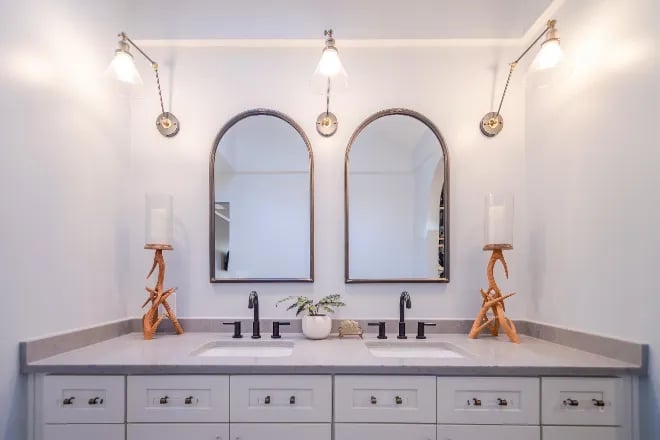 Double sink vanity with double mirrors by Ranney Blair