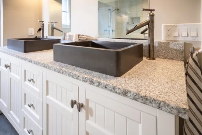 Gorgeous vessel sinks in a bathroom designed and built by Ranney Blair