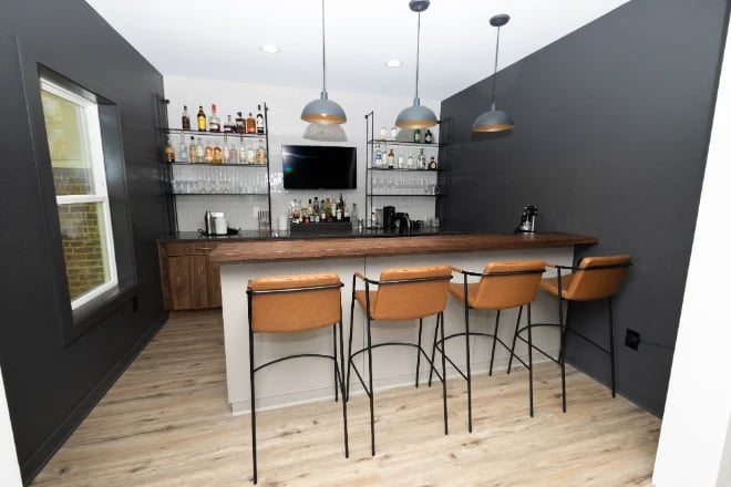 A bar installed as part of a basement remodel