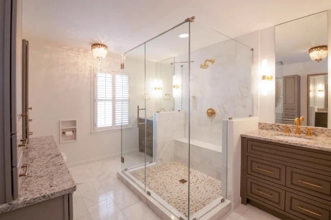 A bathroom remodeled by Ranney Blair featuring neutral wall paint colors