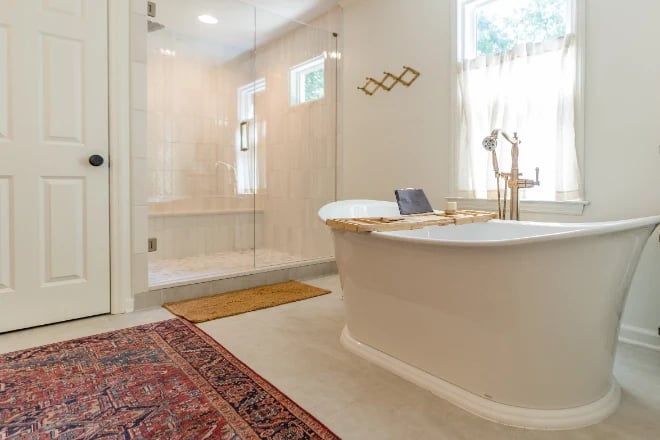 A bathroom with ceramic tile flooring