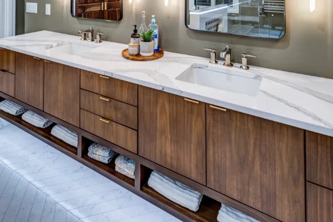 A custom double vanity with under cabinet lighting