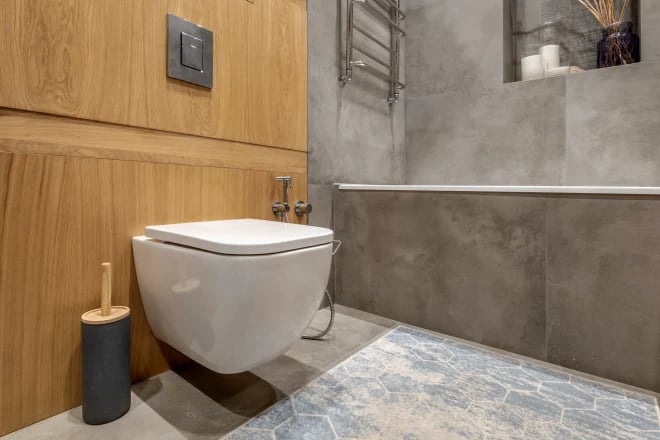 A modern bathroom with an integrated bidet toilet