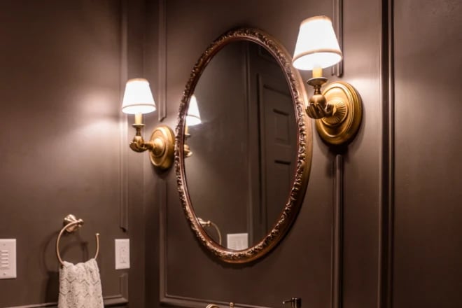 A round antique bathroom mirror