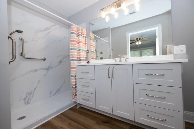 Bathroom cabinets typically take up more space than open shelving