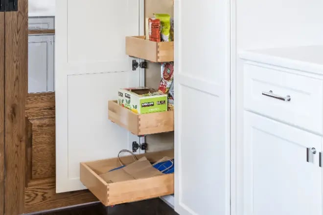 Kitchen clutter hidden away in custom cabinetry