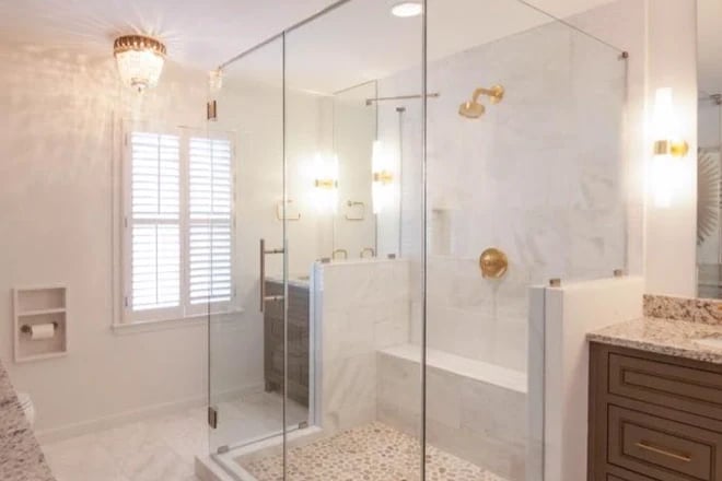 Shutters perfectly complement the design of this luxury bathroom