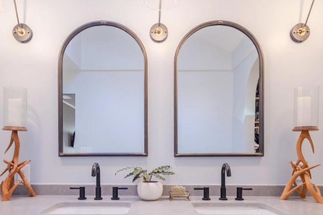 Two framed mirrors with unusual shapes