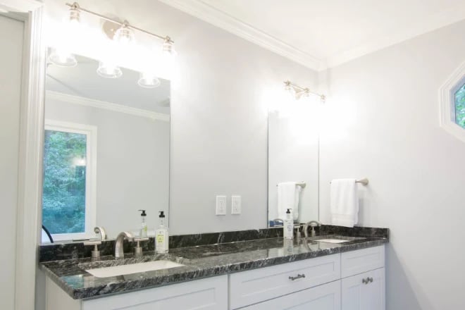 Two individual mirrors over a double vanity
