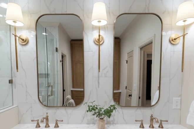 Two mirrors above a vanity
