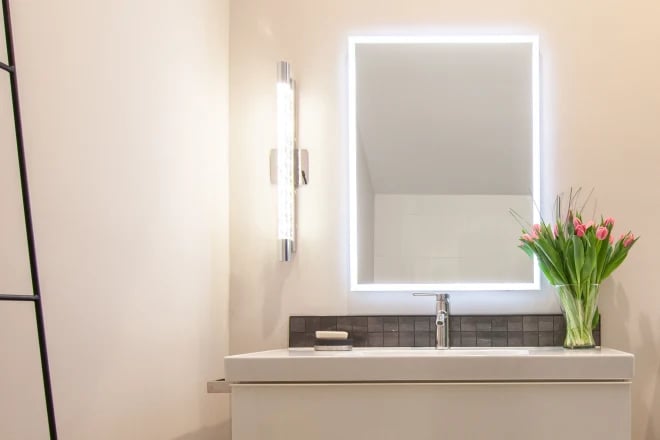 a mirror with built-in lighting