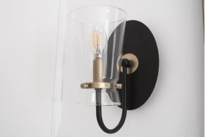 wall sconce with an incandescent bulb  in a bathroom (1)