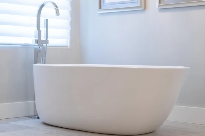 A freestanding bathtub in a bathroom remodel completed by Ranney Blair.