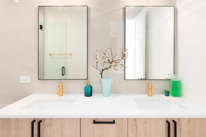 A luxury bathroom with ultra compact quartz countertops