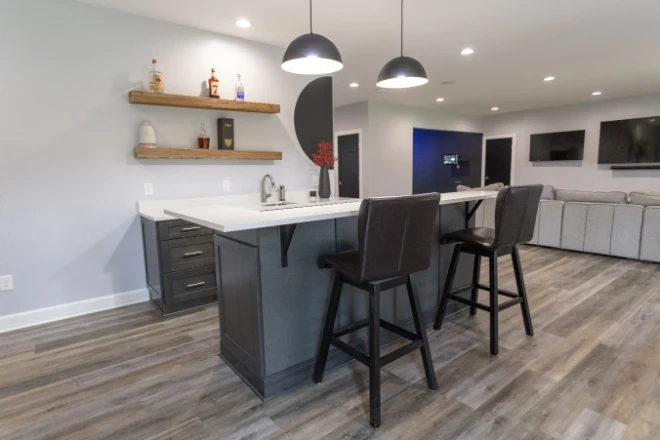 A small bar in an open concept basement remodel