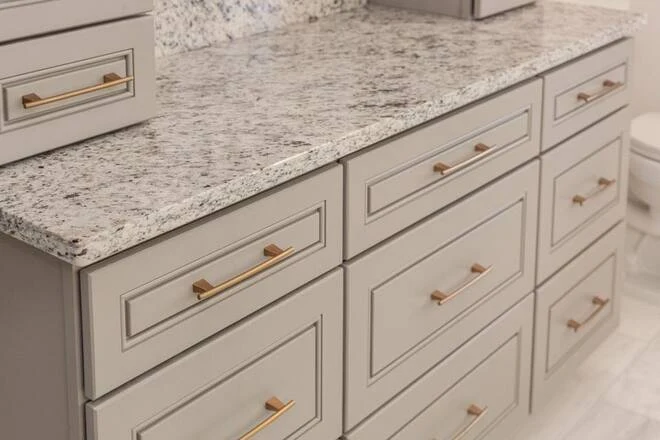 Beautiful granite countertops accentuate this bathroom vanity