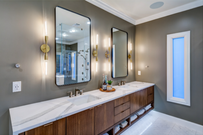 Dual-bathroom-vanity-with-under-lighting-and-open-cabinetry